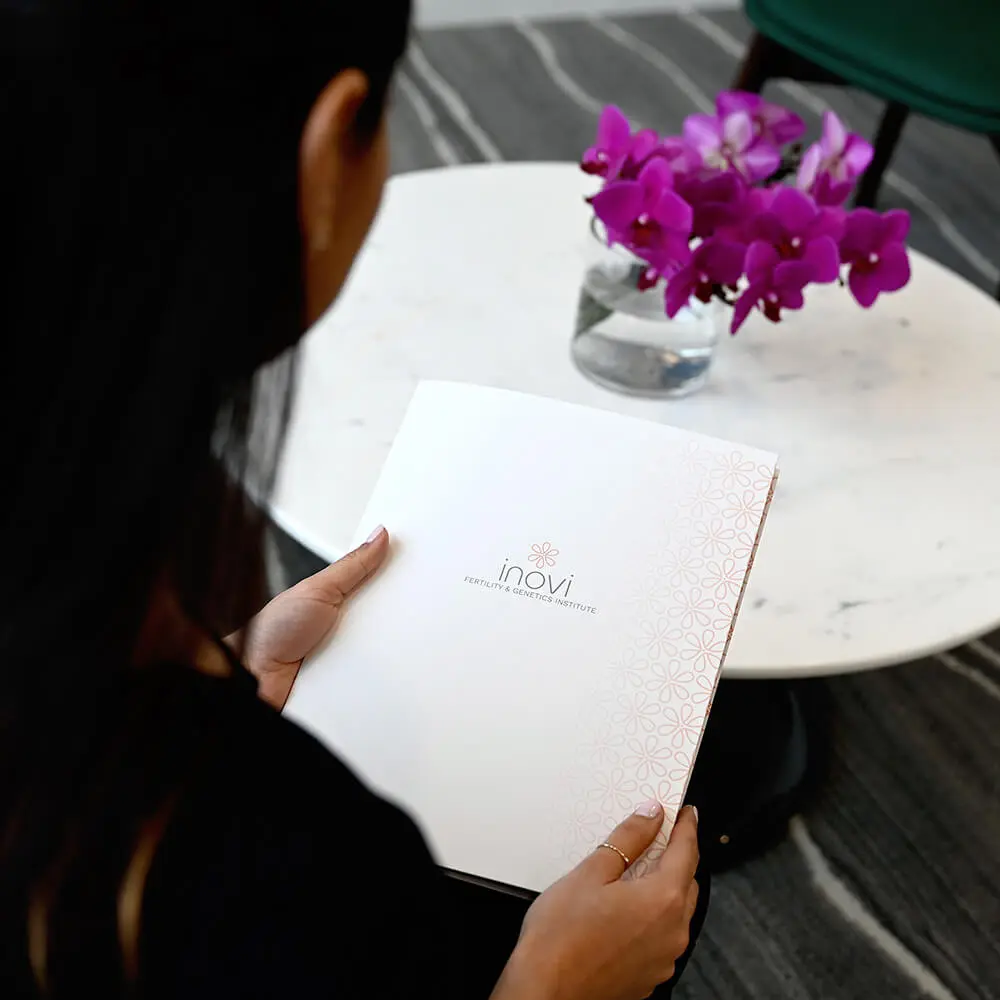 Woman reading a brochure