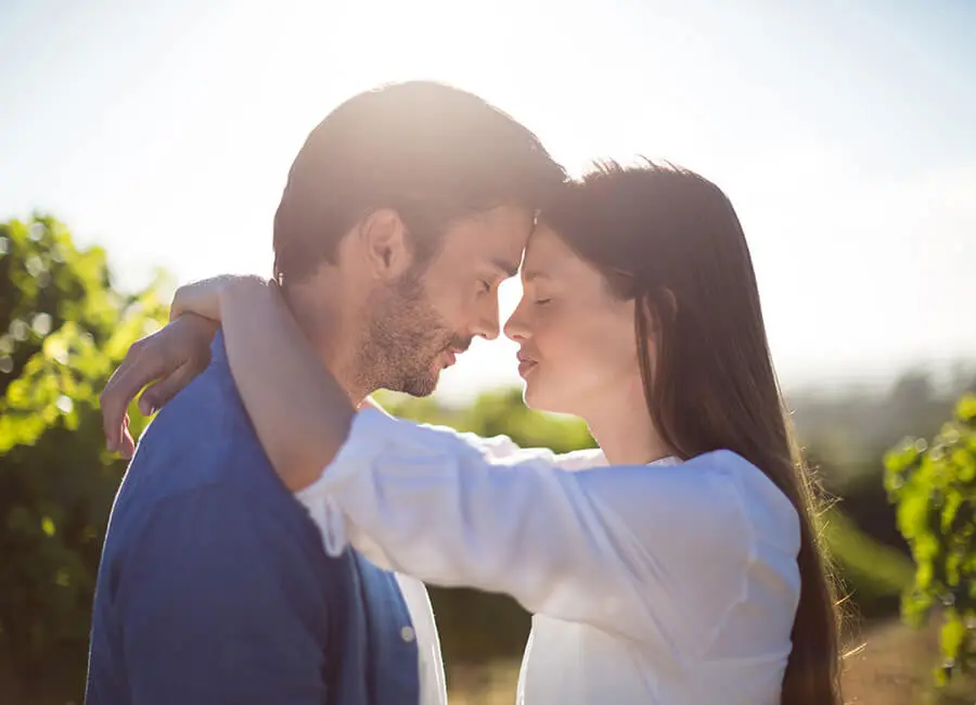 Couple hugging in the sun