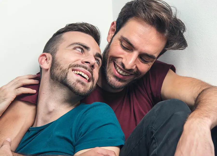 Male couple laughing together