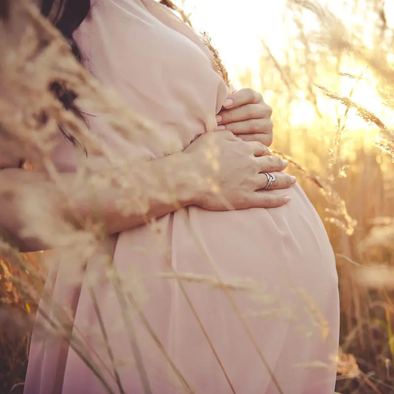 Pregnant woman outdoors